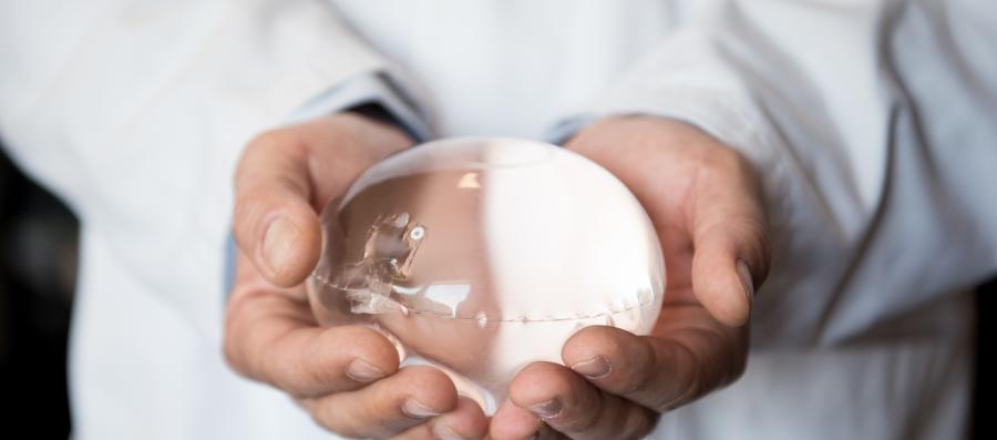 The Allurion Gastric Balloon held by a Doctor